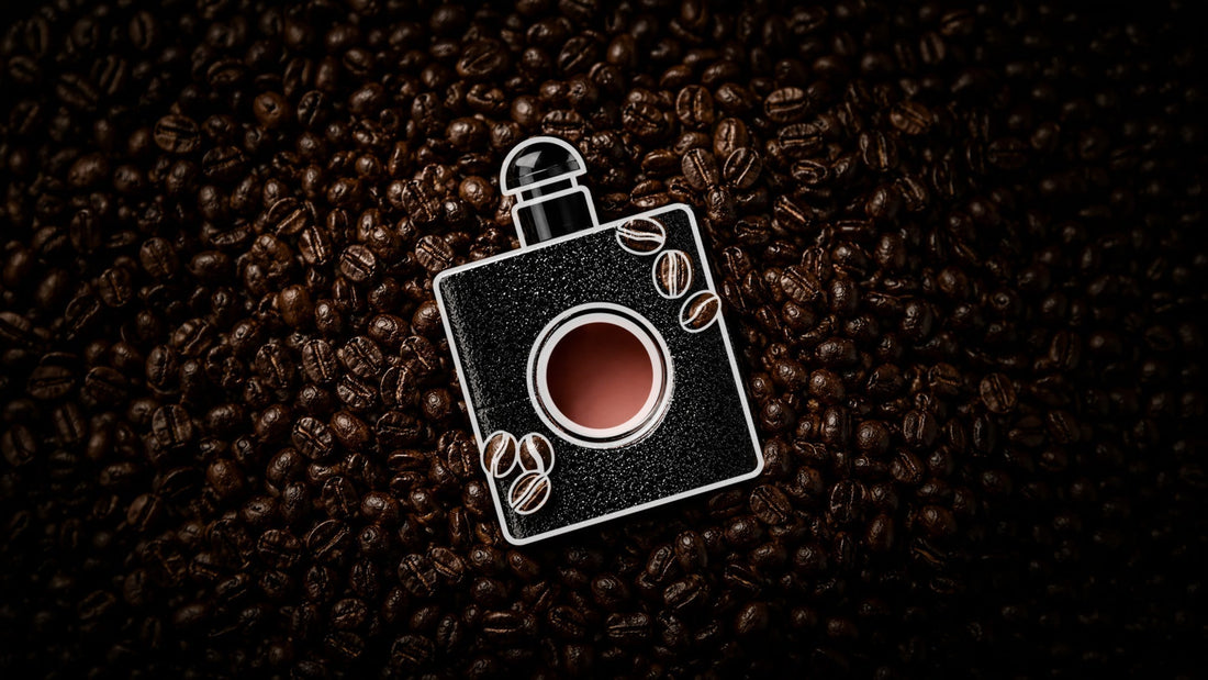 Black perfume bottle resting on a bed of roasted coffee beans, accented with white line-art coffee bean illustrations, highlighting rich coffee-inspired fragrance notes.